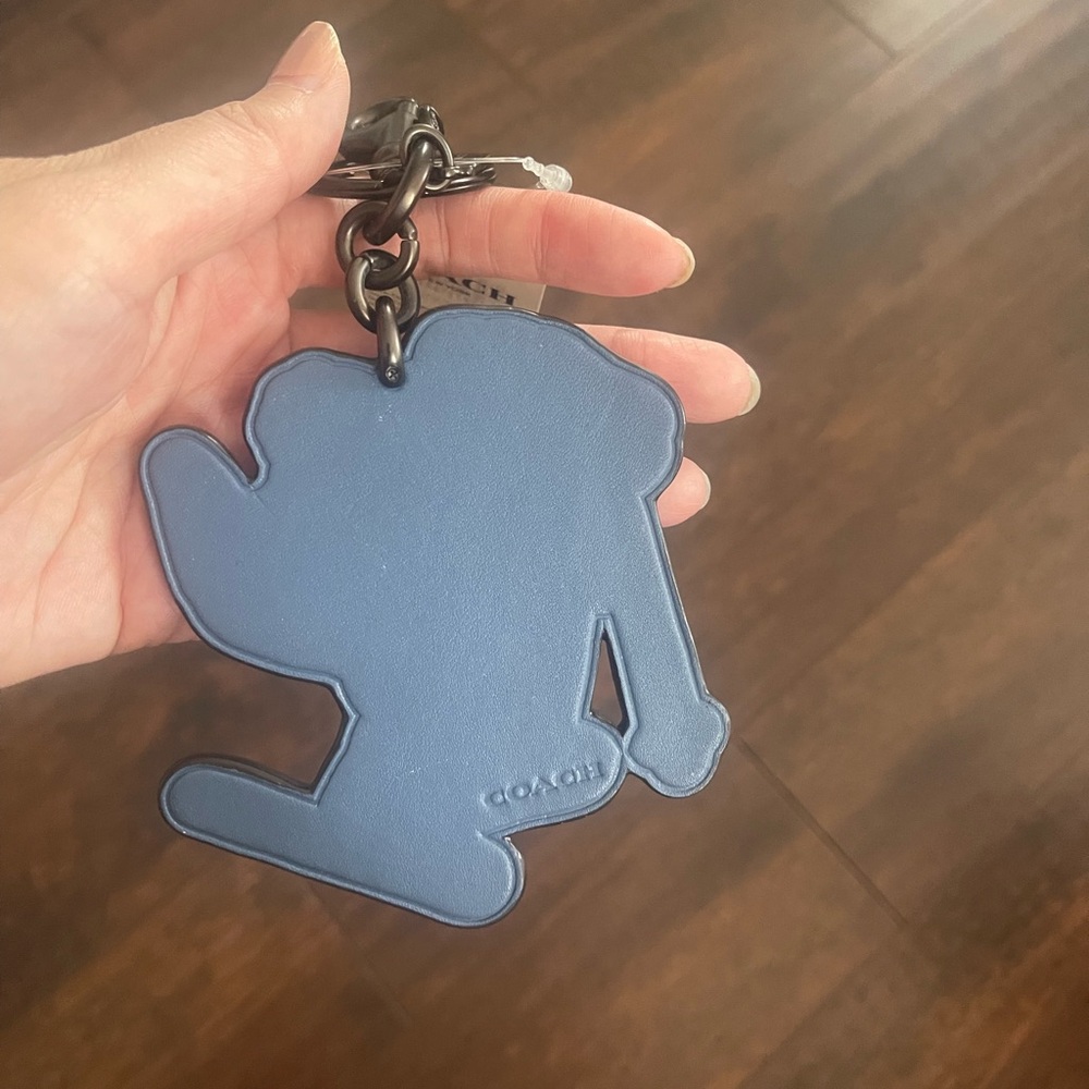 Coach Dinosaur Skiing Keychain - Picture 2 of 2